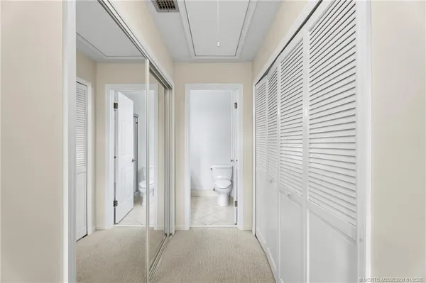a view of a bathroom with toilet