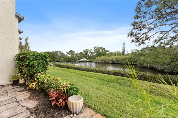 a view of a lake from a balcony
