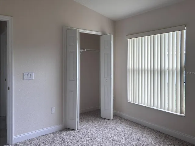 a bathroom with a toilet a sink and bathtub