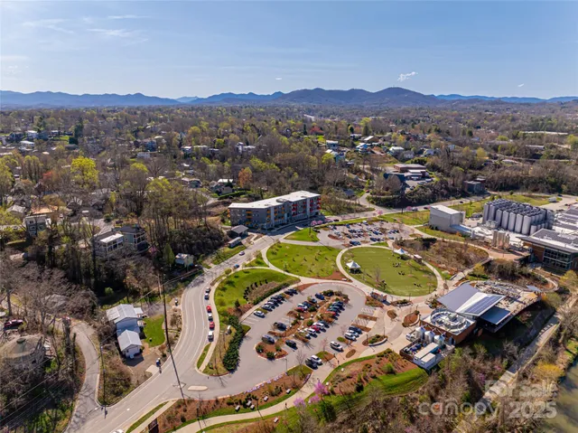 a view of a swimming pool with a table and chairs