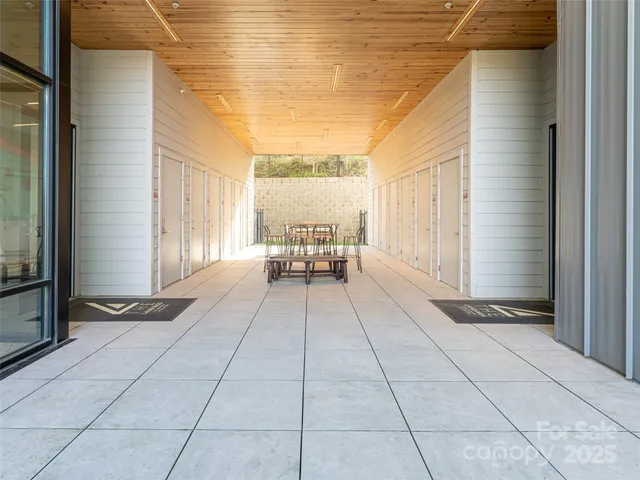 a view of a balcony with furniture
