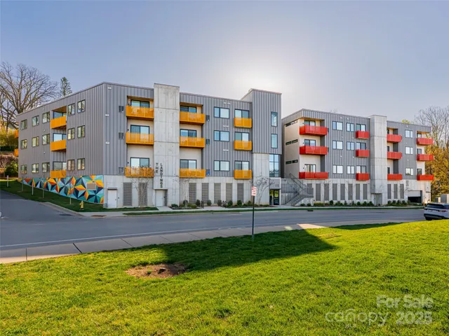 a view of swimming pool with an outdoor seating