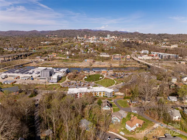 an aerial view of residential building with parking space