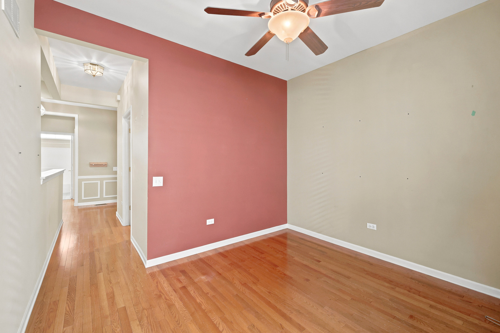 11923 Harrison Road Huntley, IL 60142 - Photo 17 of 38 wooden floor in an empty room with a window