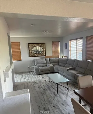 a living room with furniture and a couch