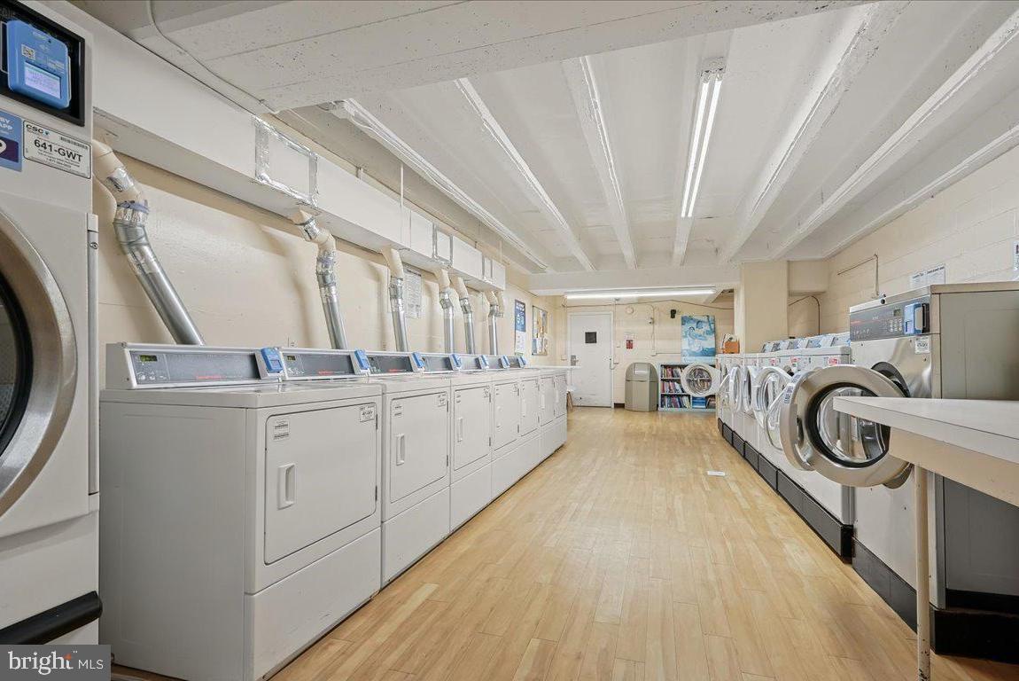 1425 4th Street Southwest, Unit A609 Washington, DC 20024 - Photo 12 of 12 a view of a storage & utility room with washer and dryer