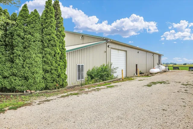 a view of a garden with houses