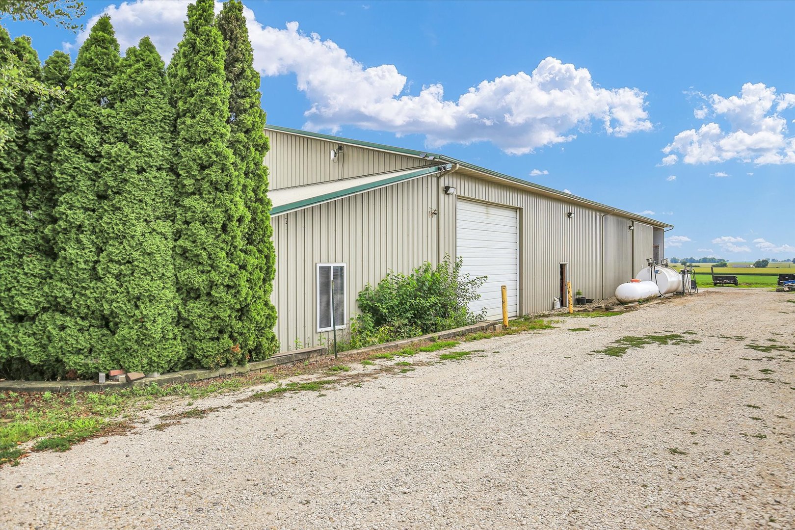 1069 County Road 900 East Champaign, IL 61822 - Photo 13 of 16 a backyard of a house