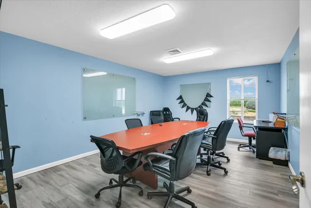 a kitchen with stainless steel appliances a refrigerator sink and microwave