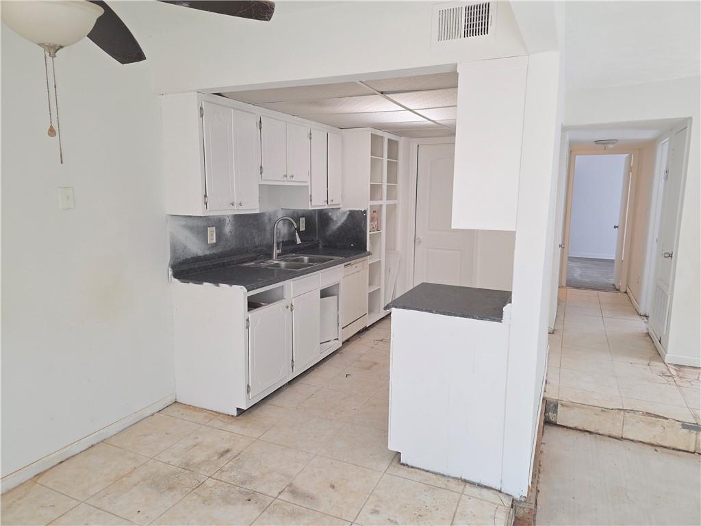 3183 Nectarine Circle Decatur, GA 30034 - Photo 4 of 15 a kitchen with a sink and a stove top oven