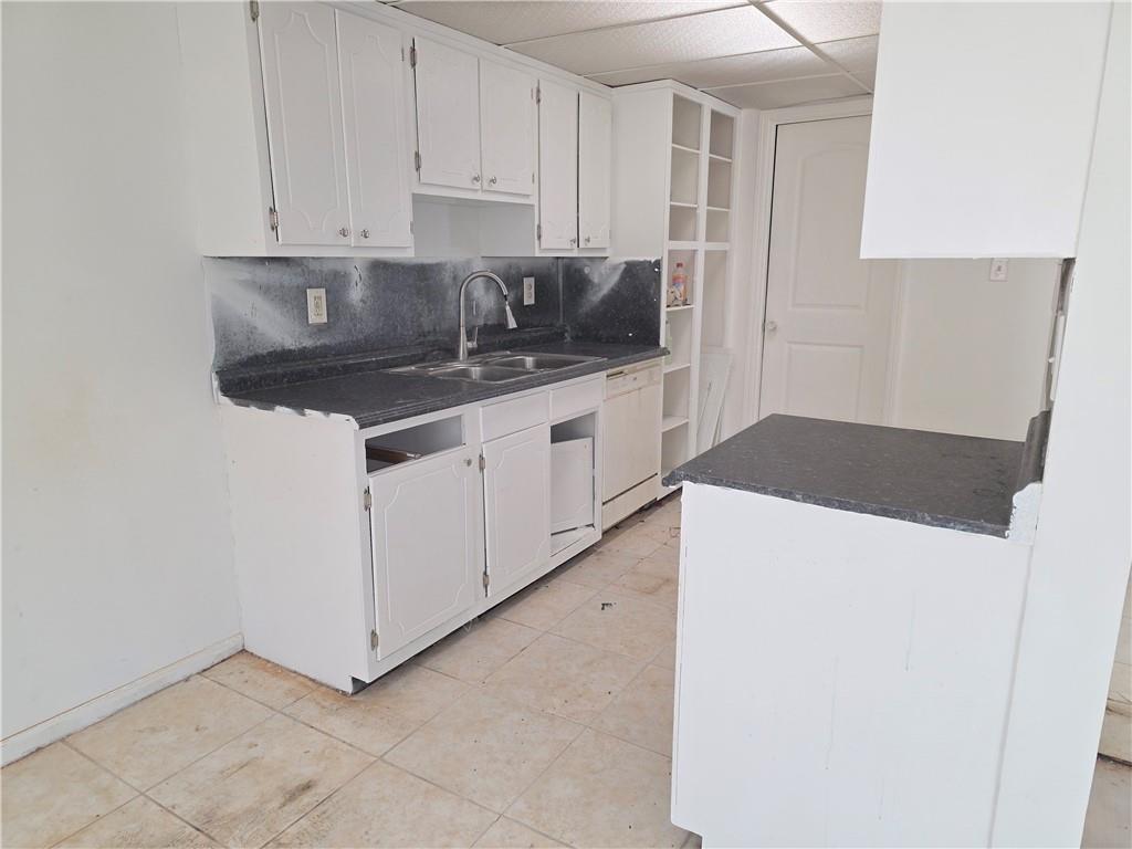 3183 Nectarine Circle Decatur, GA 30034 - Photo 5 of 15 a kitchen with granite countertop white cabinets and a sink