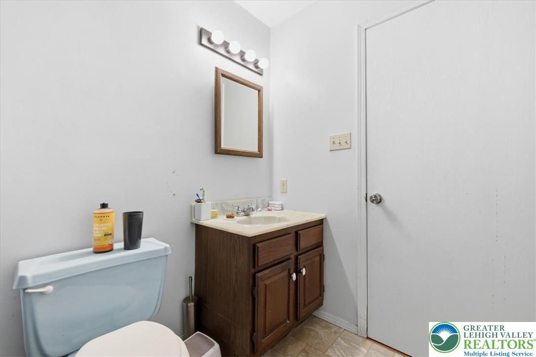 520 Highland Hill Road Jim Thorpe, PA 18235 - Photo 36 of 83 Functional full bathroom featuring a convenient vanity and commode for everyday use.