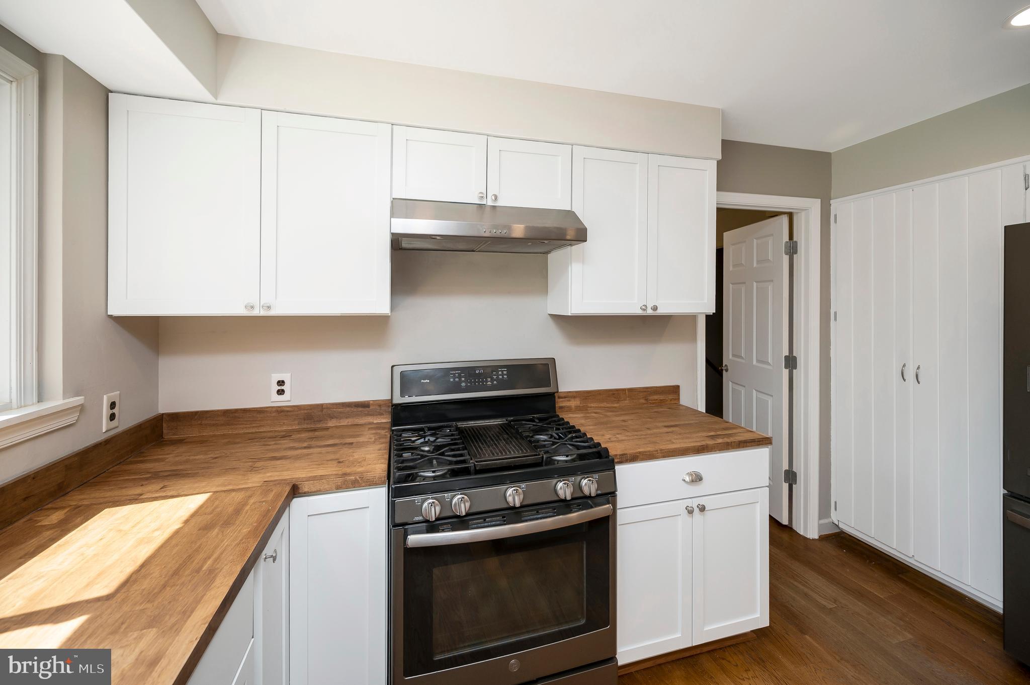 3195 Fiery Run Road Markham, VA 22643 - Photo 11 of 126 a kitchen with stainless steel appliances granite countertop a stove and a refrigerator