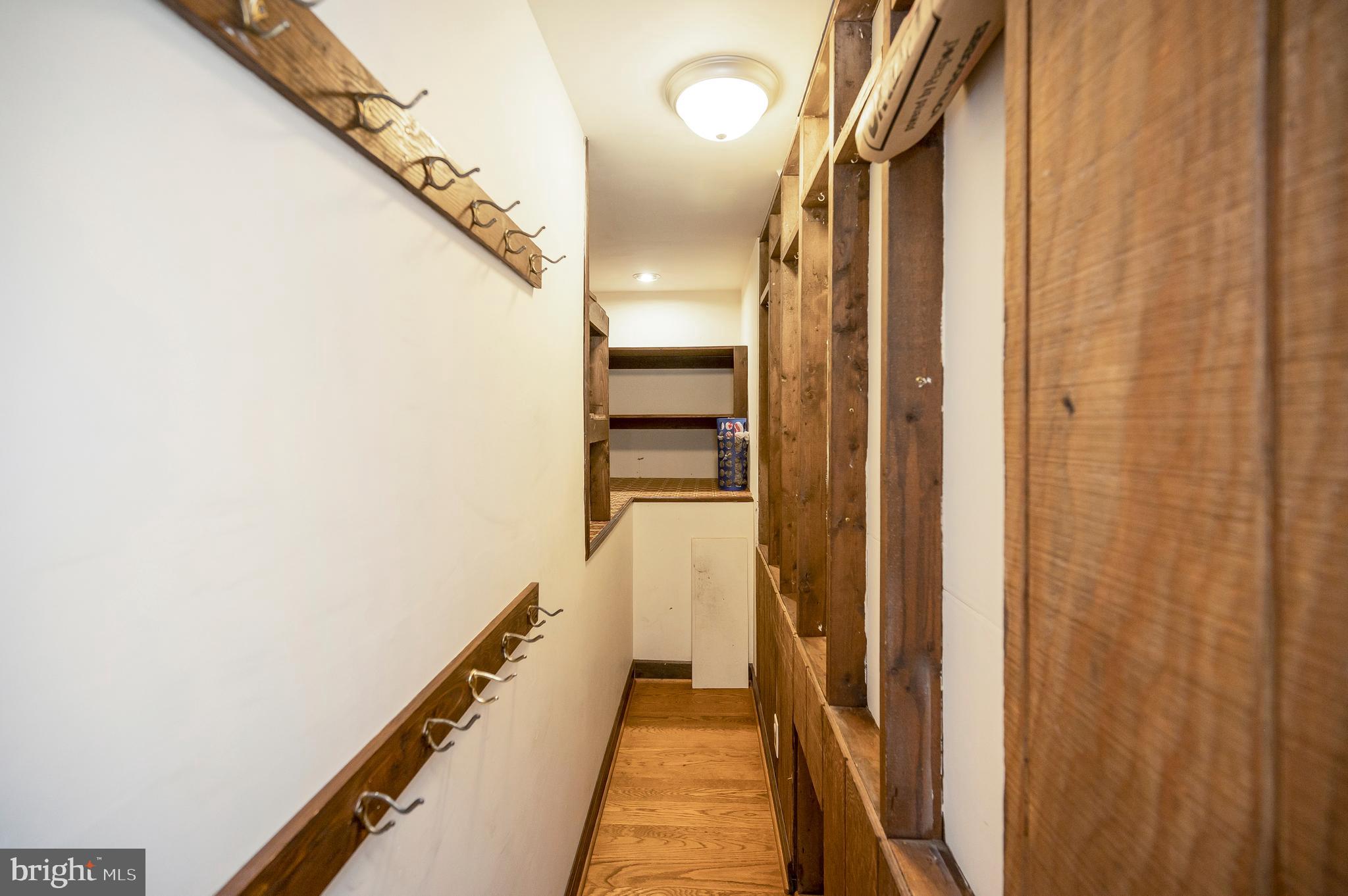 3195 Fiery Run Road Markham, VA 22643 - Photo 23 of 126 a view of a hallway with wooden floor and stairs