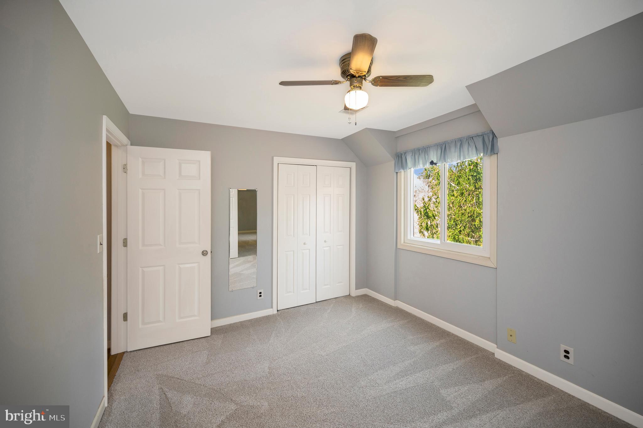 3195 Fiery Run Road Markham, VA 22643 - Photo 33 of 126 an empty room with windows and fan