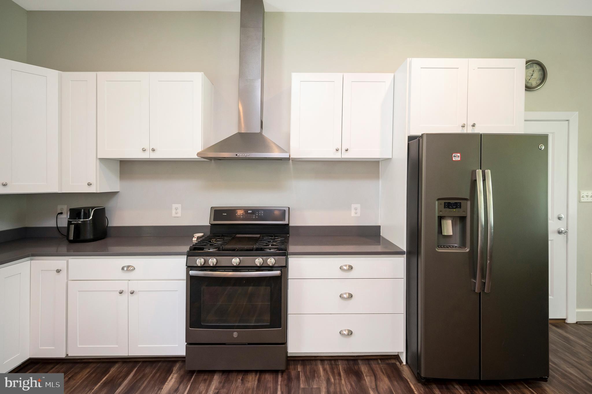 3195 Fiery Run Road Markham, VA 22643 - Photo 81 of 126 a kitchen with stainless steel appliances granite countertop a refrigerator and a stove