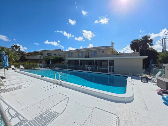a view of a house with a swimming pool