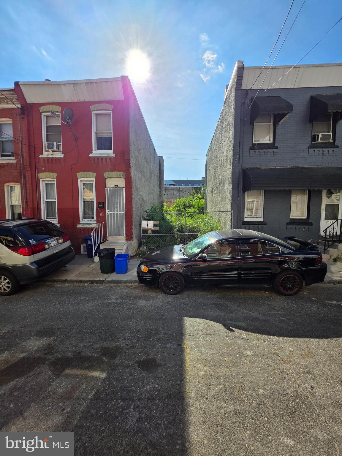 2136 North Percy Street Philadelphia, PA 19122 - Photo 2 of 4 a car parked in front of a brick house