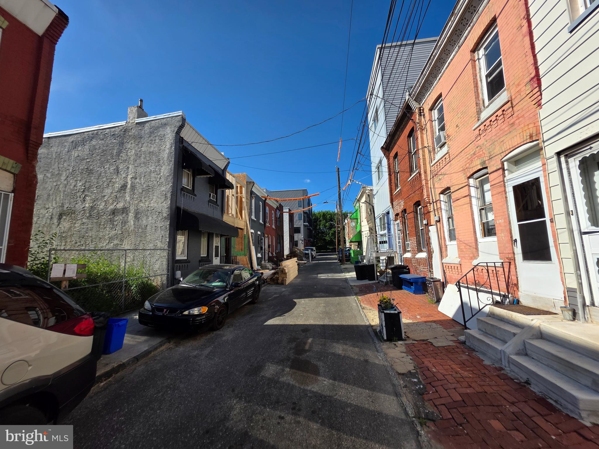 2136 North Percy Street Philadelphia, PA 19122 - Photo 4 of 4 a city street lined with buildings and cars