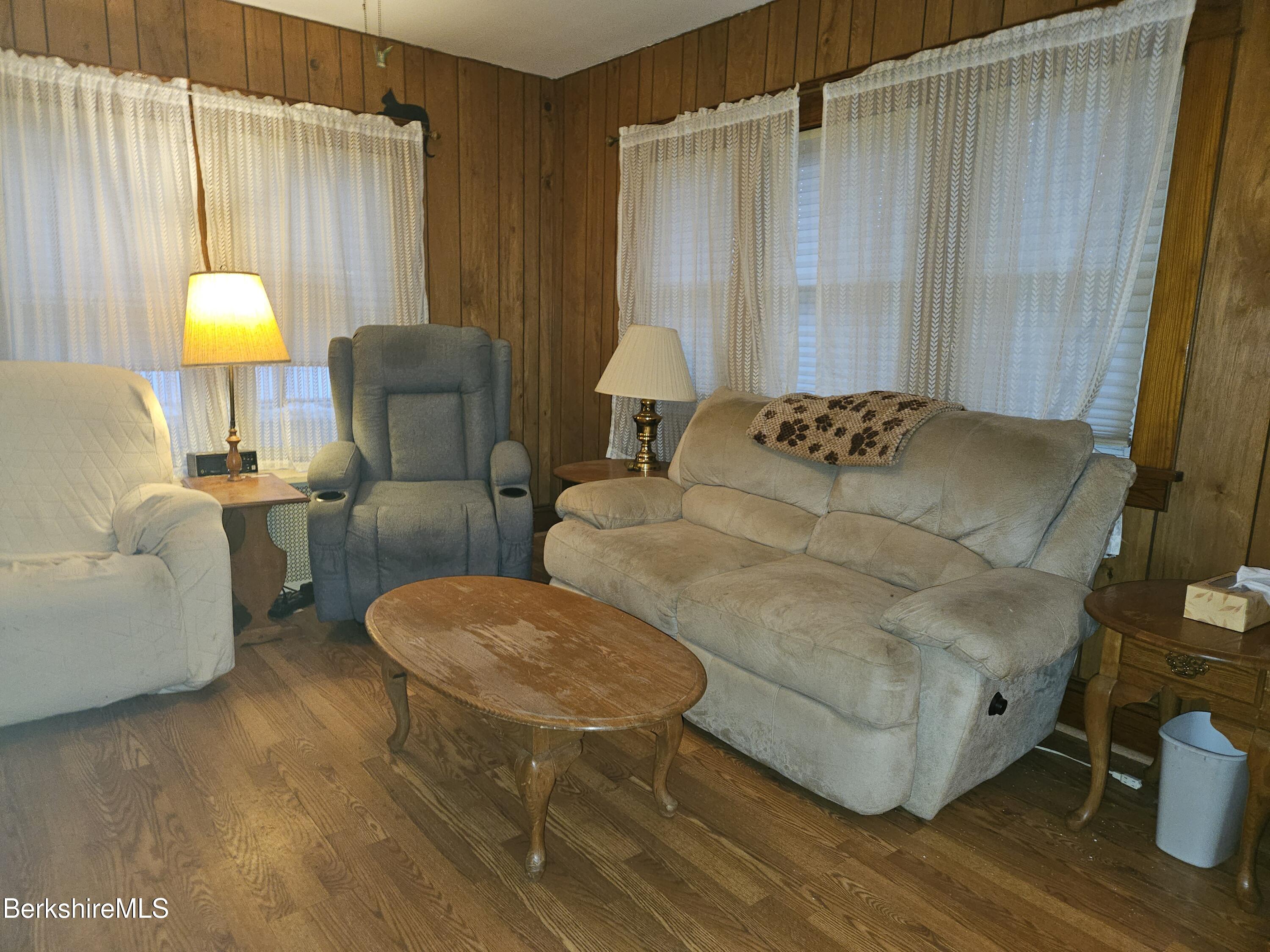 269 2nd Street Pittsfield, MA 01201 - Photo 7 of 39 a living room with furniture and a chandelier