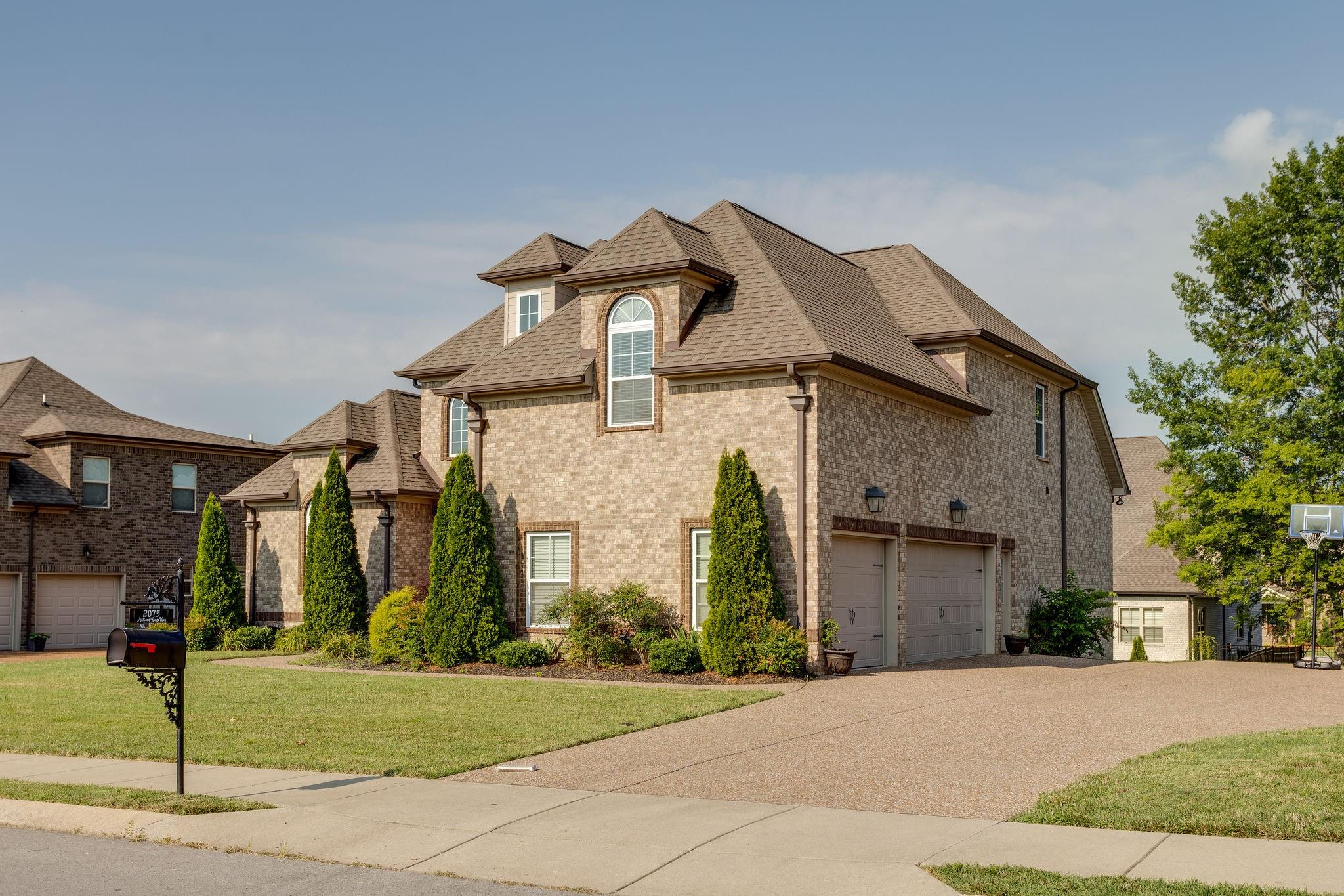 Large 3 car garage, extra aggregate space for basketball and extra parking