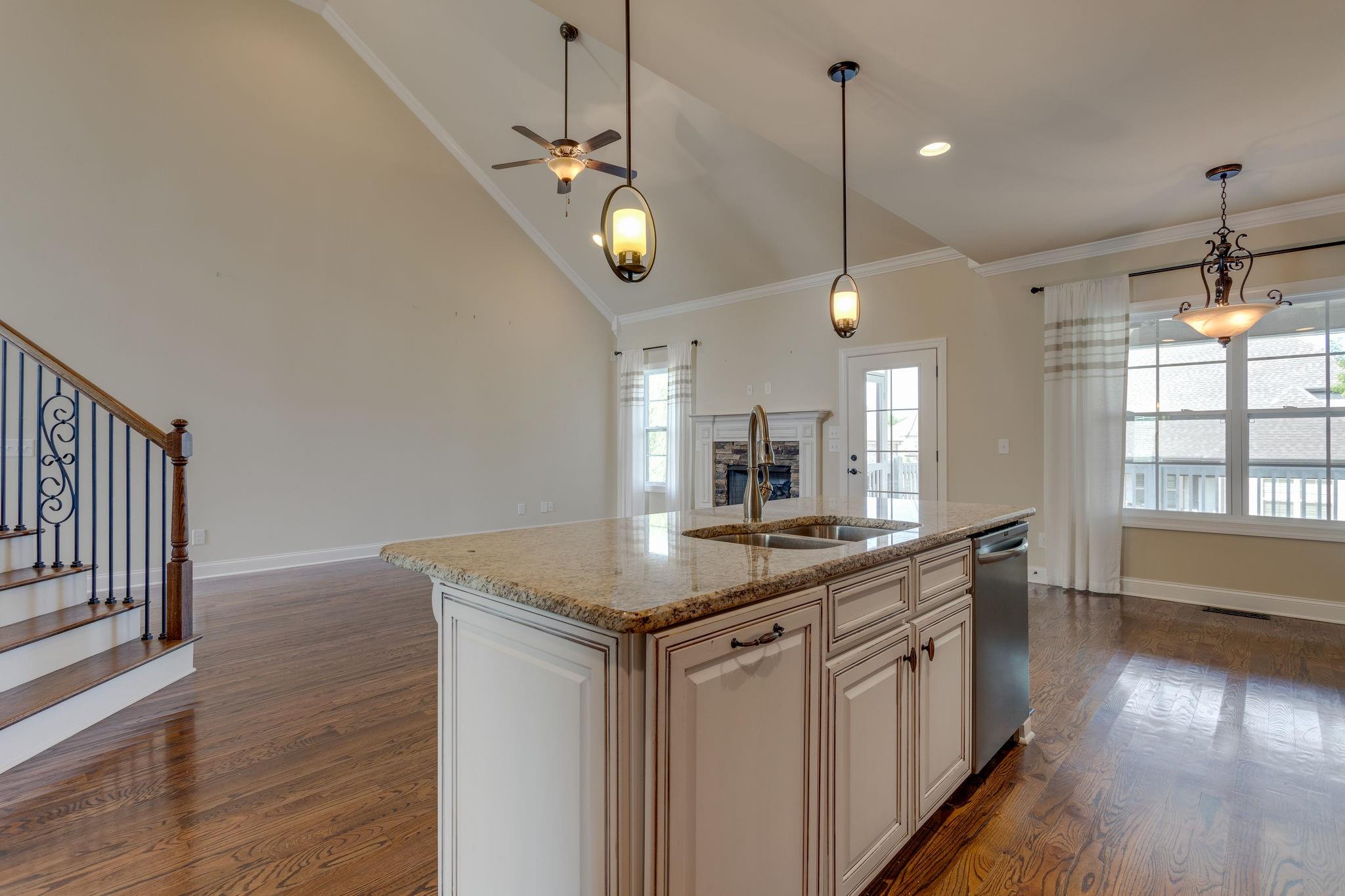 2075 Autumn Ridge Way Spring Hill, TN 37174 - Photo 12 of 27 Great family time here with the kitchen flowing into the living room.