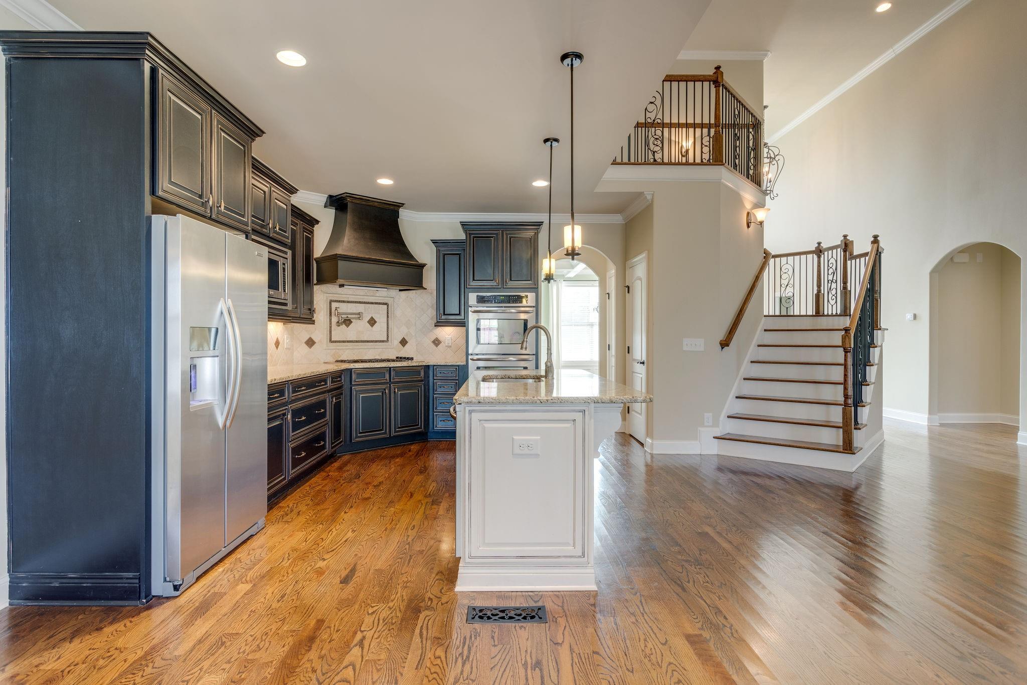 2075 Autumn Ridge Way Spring Hill, TN 37174 - Photo 13 of 27 Love the two color cabinets in this space.