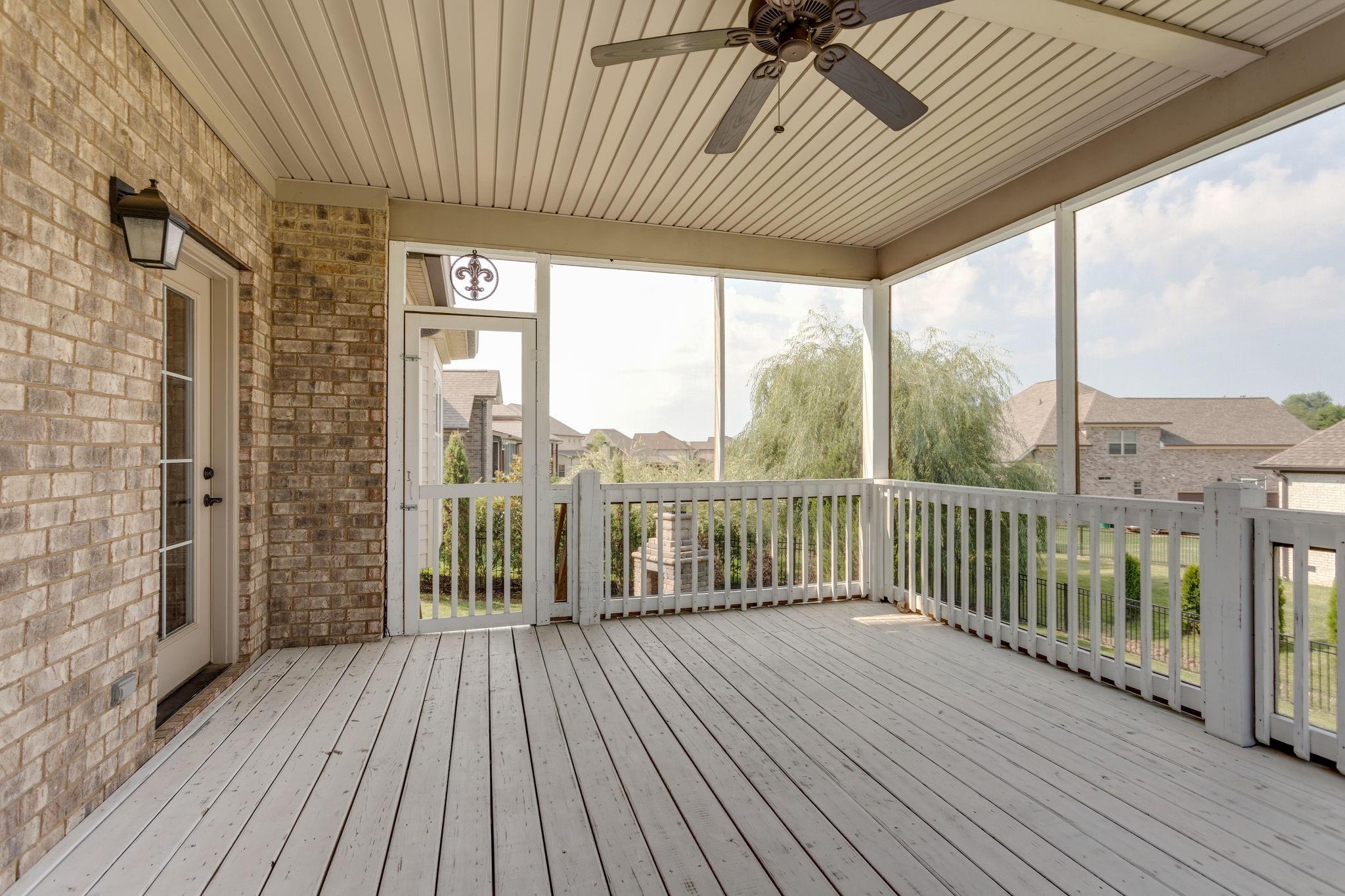 2075 Autumn Ridge Way Spring Hill, TN 37174 - Photo 24 of 27 Large screened in deck off the living room.