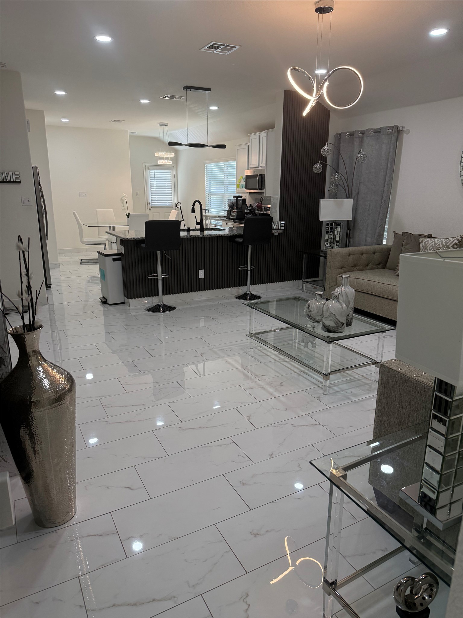 216 Star Pass Jarrell, TX 76537 - Photo 2 of 11 a large room with a lot of furniture and clutter