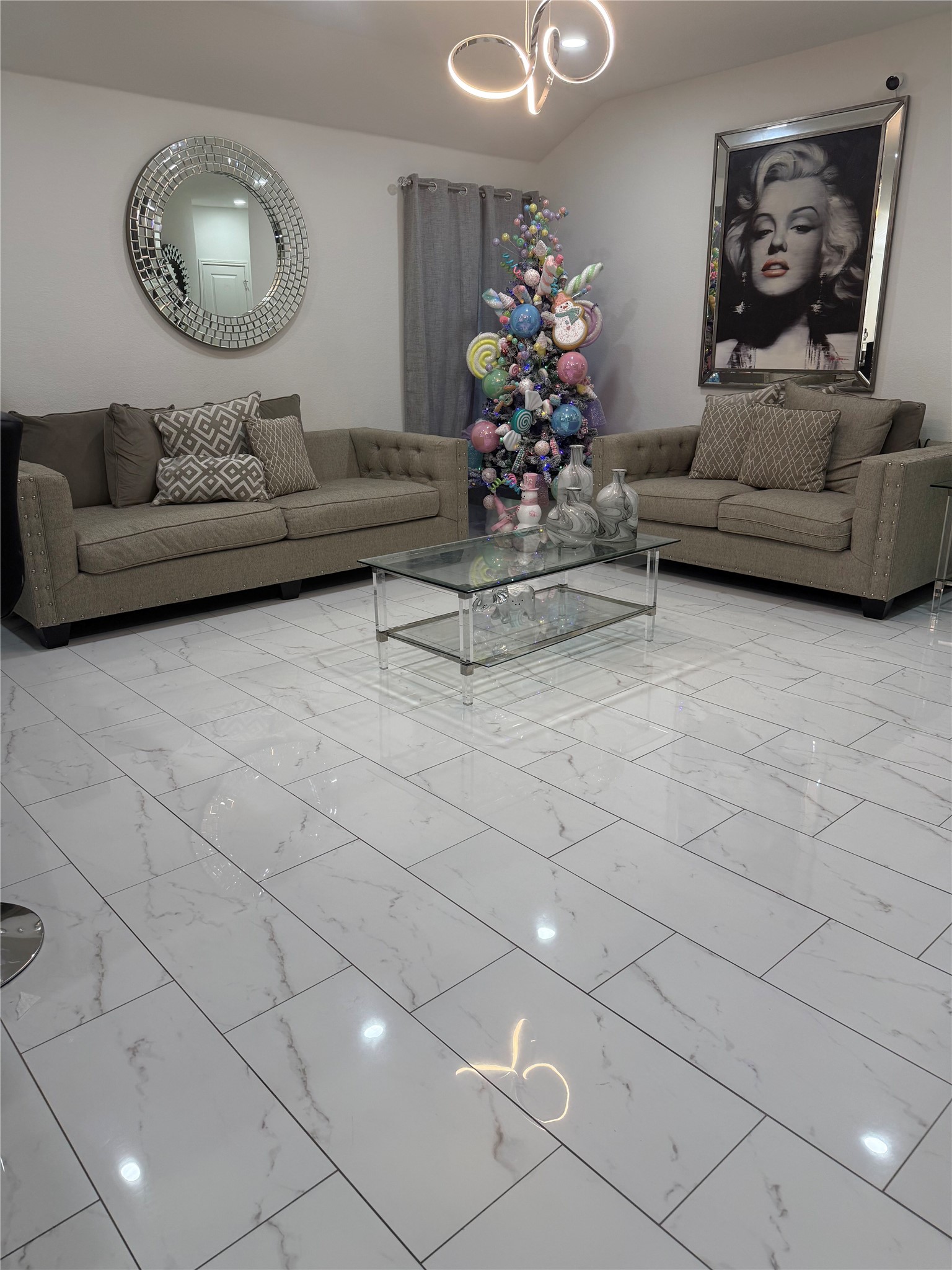 216 Star Pass Jarrell, TX 76537 - Photo 6 of 11 a living room with furniture and a chandelier