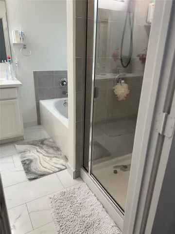 a bathroom with a bathtub
