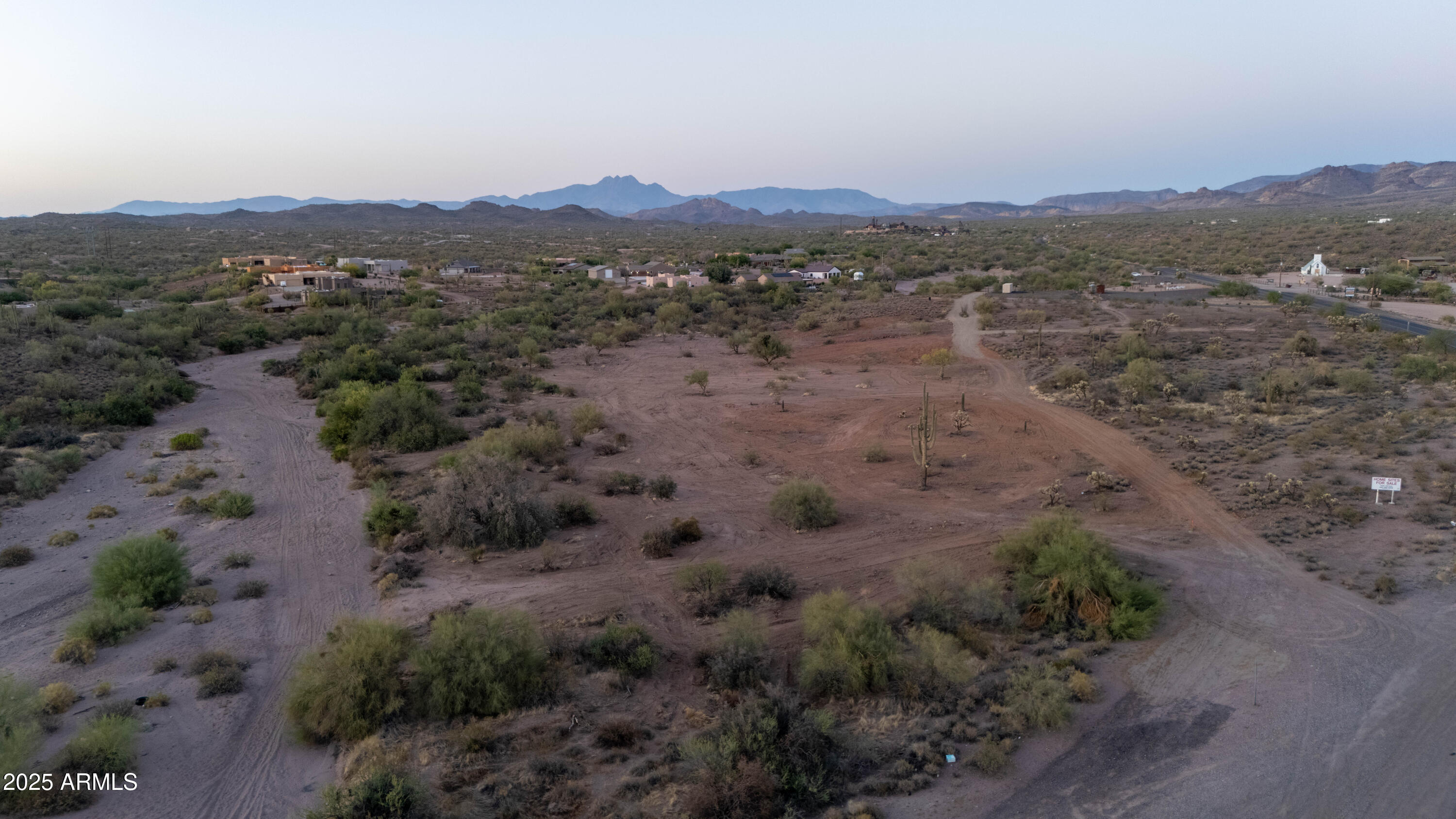 Xxx East Xxx E Compound Trail, Unit E Apache Junction, AZ 85119 - Photo 9 of 14 a view of a lake with mountains in the background