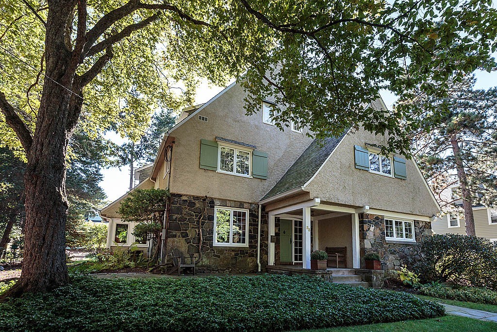 front view of a house with a yard