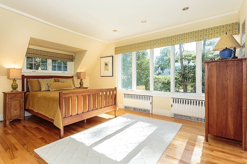 23 Jefferson Road Winchester, MA 01890 - Photo 15 of 30 a bedroom with a bed and a window