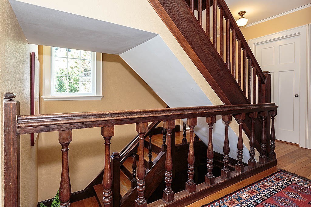 23 Jefferson Road Winchester, MA 01890 - Photo 22 of 30 a view of staircase with wooden floor and a window