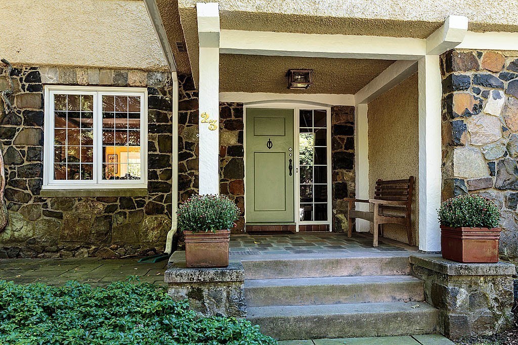23 Jefferson Road Winchester, MA 01890 - Photo 3 of 30 a front view of a house with garden