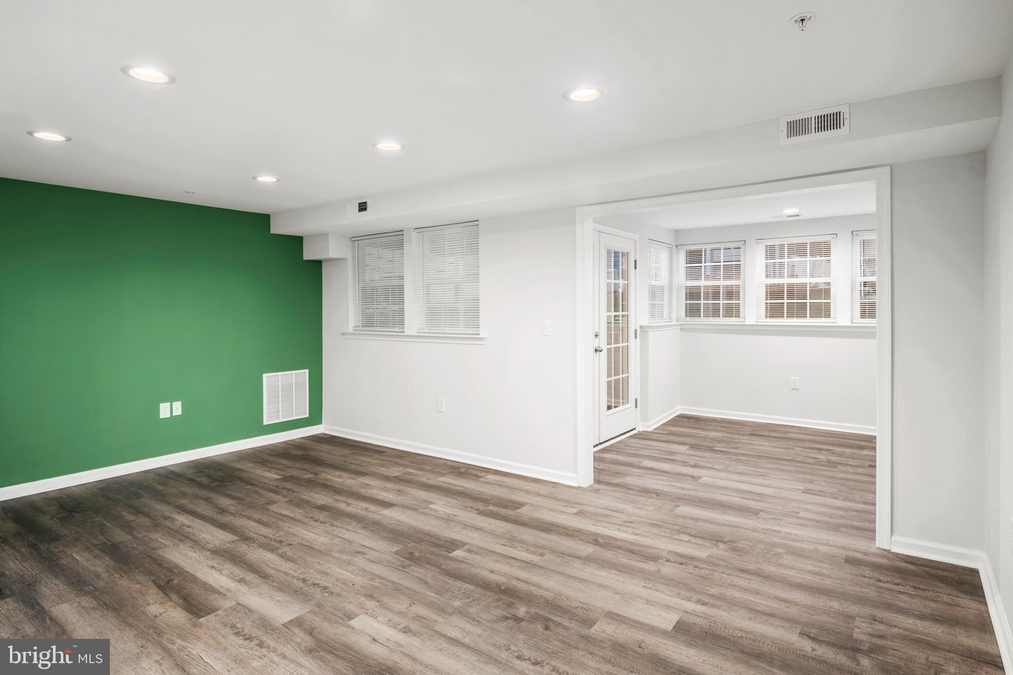 6335 Greenfield Road, Unit 1702 Elkridge, MD 21075 - Photo 2 of 19 Foyer View to Living Room and Sunroom