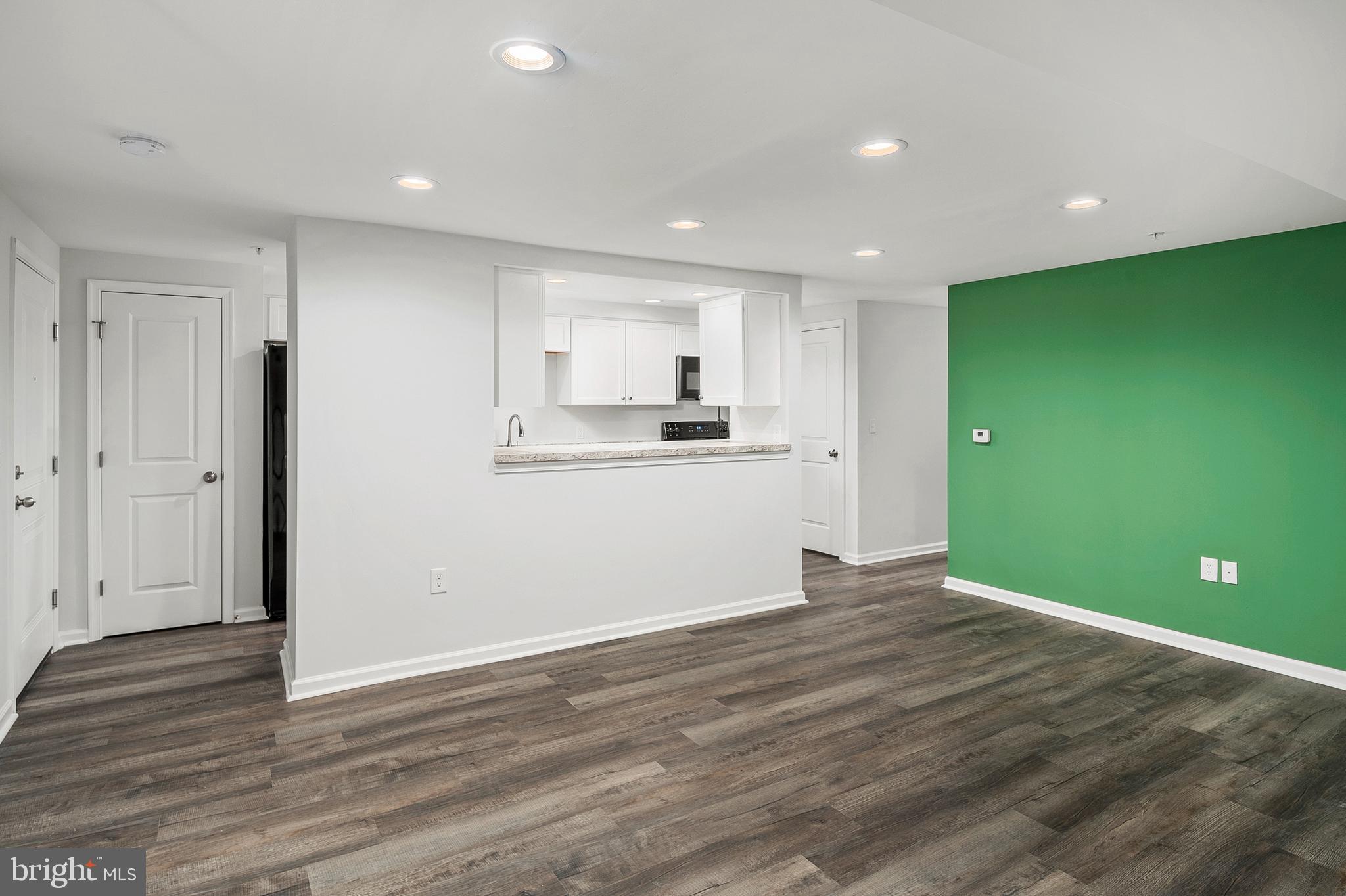 6335 Greenfield Road, Unit 1702 Elkridge, MD 21075 - Photo 7 of 19 Living Room to Kitchen