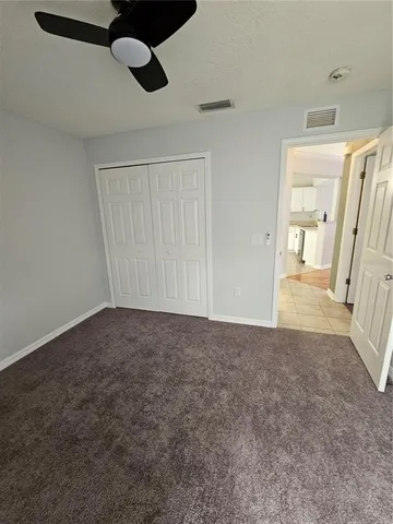 a view of an empty room with a sliding door