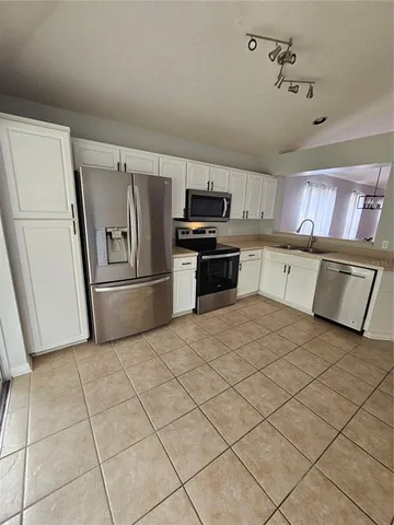 a view of a house with a garden