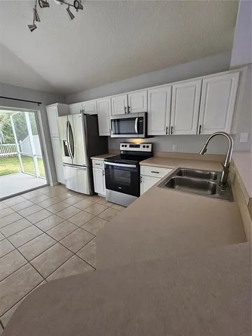 a view of a backyard with a garden