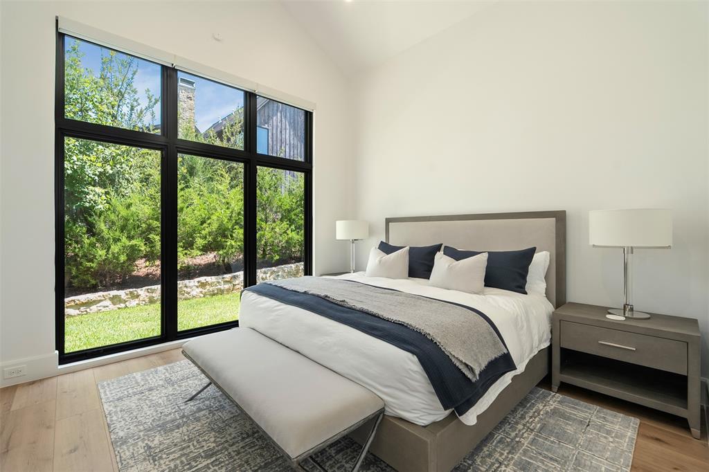 455 Sun Valley Mabank, TX 75147 - Photo 22 of 35 a bedroom with a bed and a large window