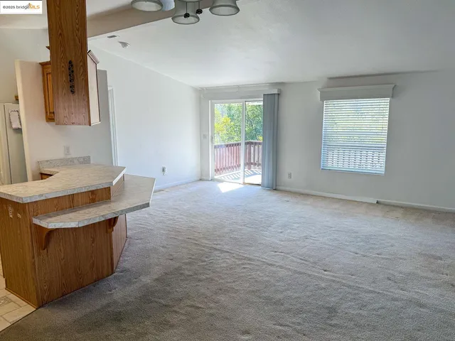 a view of an empty room with a sink
