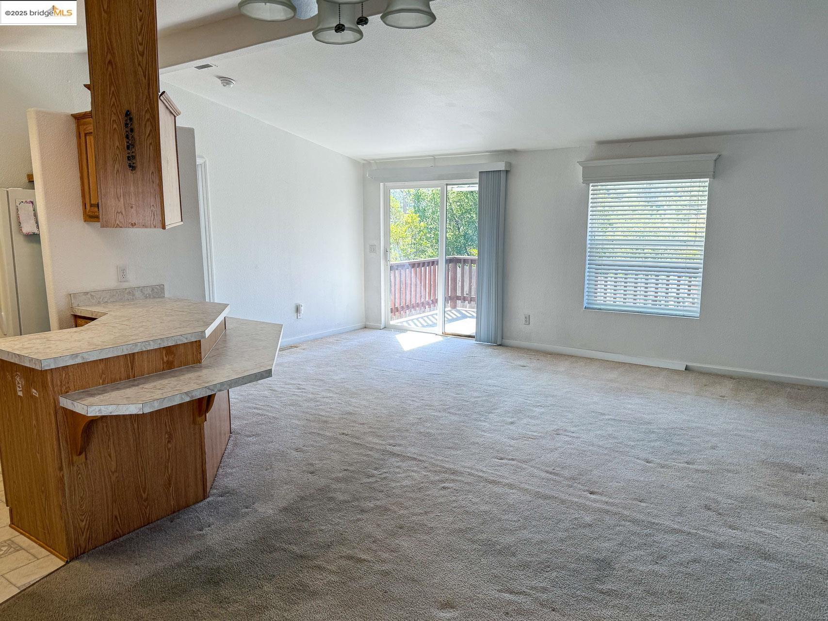 18717 Mill Villa Road, Unit 637 Jamestown, CA 95327 - Photo 5 of 19 a view of an empty room with a sink