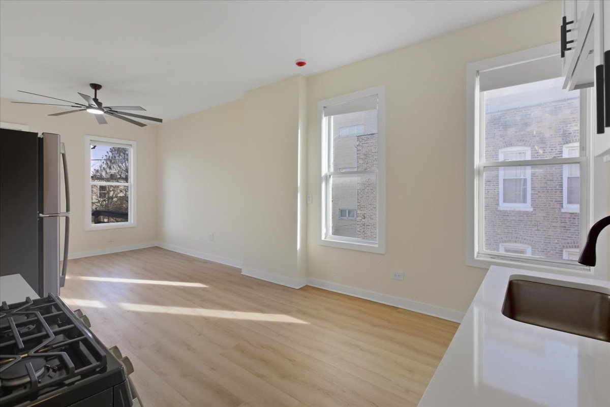1322 West Ohio Street, Unit 2R Chicago, IL 60642 - Photo 6 of 10 a view of an empty room with a window