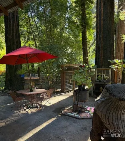 a view of a balcony with chairs