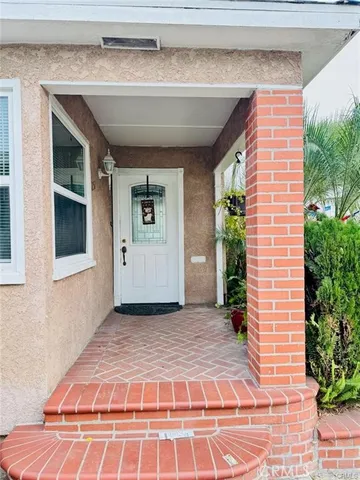 a view of entrance gate of a house