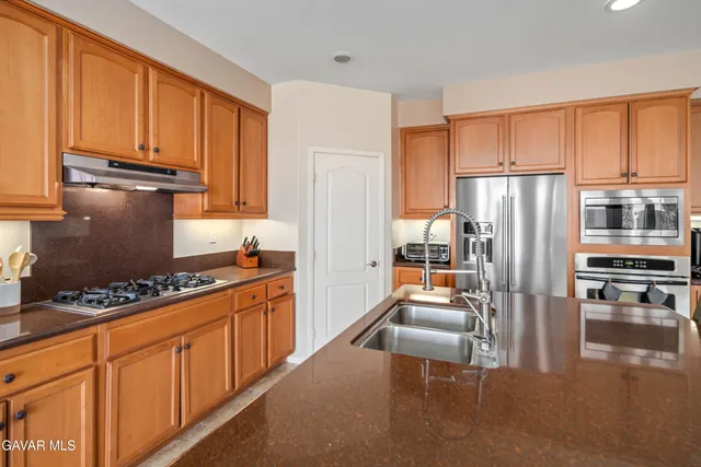 a view of an empty room and window fire place