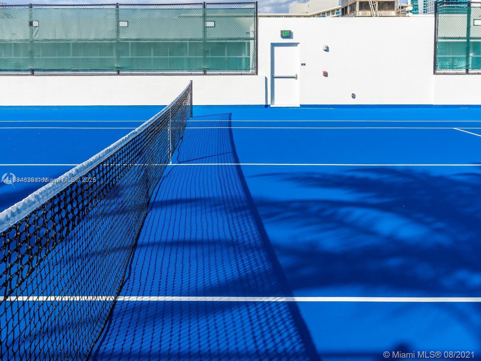4010 South Ocean Drive, Unit R401 Hollywood, FL 33019 - Photo 6 of 20 a view of a room with wooden floor