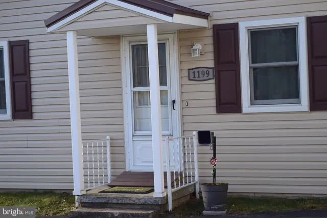 a front view of a building with entryway